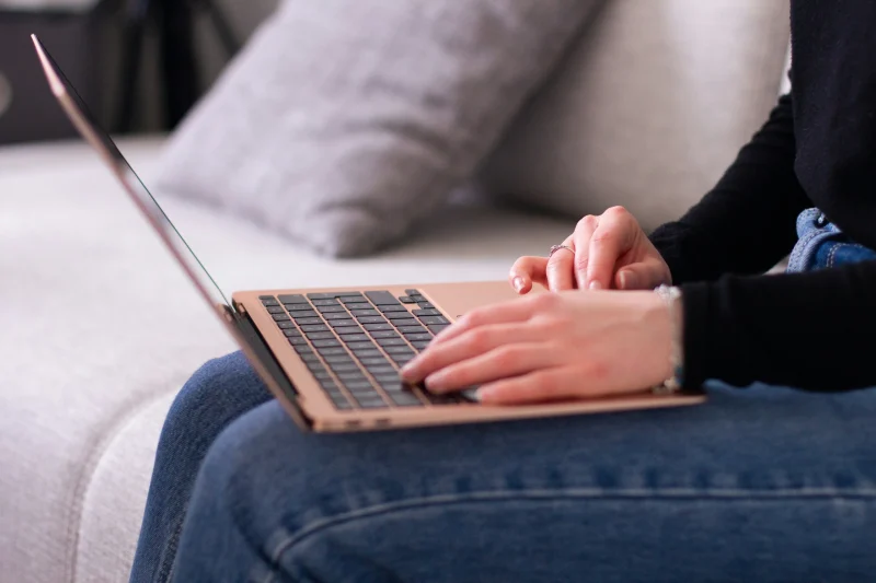 Woman using laptop for online counselling